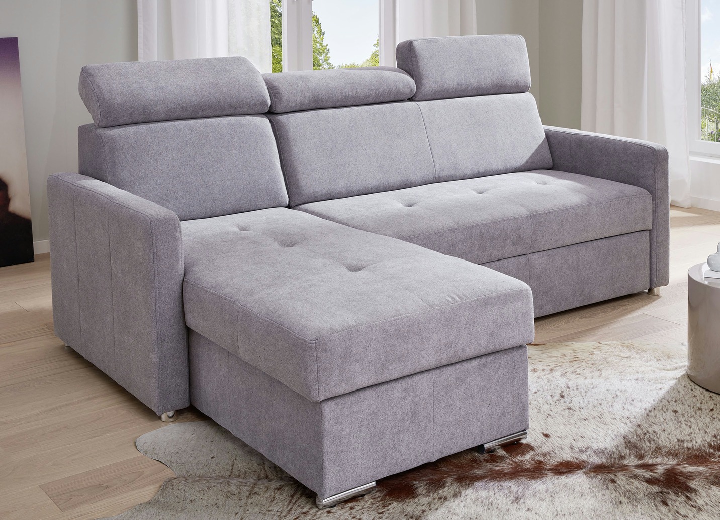 Polsterecke mit Funktion und beidseitig montierbarer Ottomane