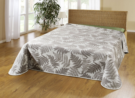 Tagesdecke mit naturnahen Blättermotiven