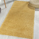 Modern - Traumhaft flauschige Brücken und Teppiche in Shaggy-Qualität, in Größe 111 (Brücke 60x90 cm) bis 304 (Teppich rund ø 150 cm), in Farbe DUNKELGRAU – Farbe GOLD – Ansicht 3
