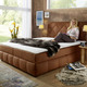 Boxspringbetten - Boxspringbett mit Bettkasten und Topper, in Farbe GRAU – Farbe COGNAC – Ansicht 1