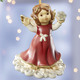 Goebel-Figuren - Goebel-Engel-Aufhänger aus Feinsteingut, in Farbe BORDEAUX, in Ausführung Engel stehend – Winterspaß – Farbe BORDEAUX – Ansicht 1