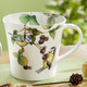 Wohnaccessoires - Henkelbecher aus Fine-Bone-China-Porzellan – Farbe BUNT – Ansicht 1 Wohnaccessoires - Henkelbecher aus Fine-Bone-China-Porzellan, in Farbe BUNT, in Ausführung Motiv Buchfinken – Farbe BUNT – Ansicht 1