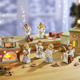 Goebel-Figuren - Szene Lebkuchenbäckerei aus der Nina & Marco-Serie – Farbe BLAU – Ansicht 2 Goebel-Figuren - Szene Lebkuchenbäckerei aus der Nina & Marco-Serie, in Farbe BLAU, in Ausführung Engel mit Waage – Farbe BLAU – Ansicht 2
