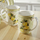 Geschirr - Hochwertige Fine-Bone-China-Porzellan-Serie – Farbe WEISS-GELB – Ansicht 1 Geschirr - Hochwertige Fine-Bone-China-Porzellan-Serie, in Farbe WEISS-GELB, in Ausführung Henkelbecher, 2er-Set – Farbe WEISS-GELB – Ansicht 1