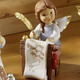 Goebel-Figuren - Szene Lebkuchenbäckerei aus der Nina & Marco-Serie – Farbe BUNT – Ansicht 1 Goebel-Figuren - Szene Lebkuchenbäckerei aus der Nina & Marco-Serie, in Farbe BLAU, in Ausführung Engel mit Waage – Farbe BUNT – Ansicht 1