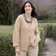Basics - Strickjacke mit Paillettengarn – Farbe BEIGE MELIERT – Ansicht 1 Basics - Strickjacke mit Paillettengarn, in Größe 036 bis 052, in Farbe JEANSBLAU MELIERT – Farbe BEIGE MELIERT – Ansicht 1