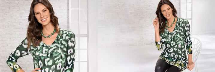 Dame mit grün-weißer Tunika und schwarzer Hose