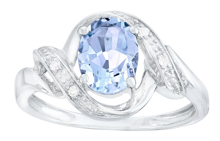 Moderner Damenring mit Blautopas und echt Weißtopas 