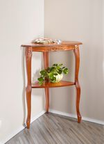 Eckregal mit aufwendiger Zierschnitzerei 