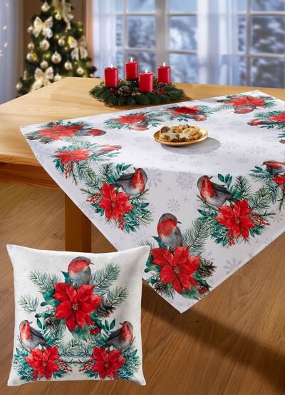 Tisch- und Raumdekoration mit niedlichen Rotkehlchen 