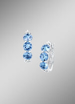 Verzierte Creolen mit Blautopas 