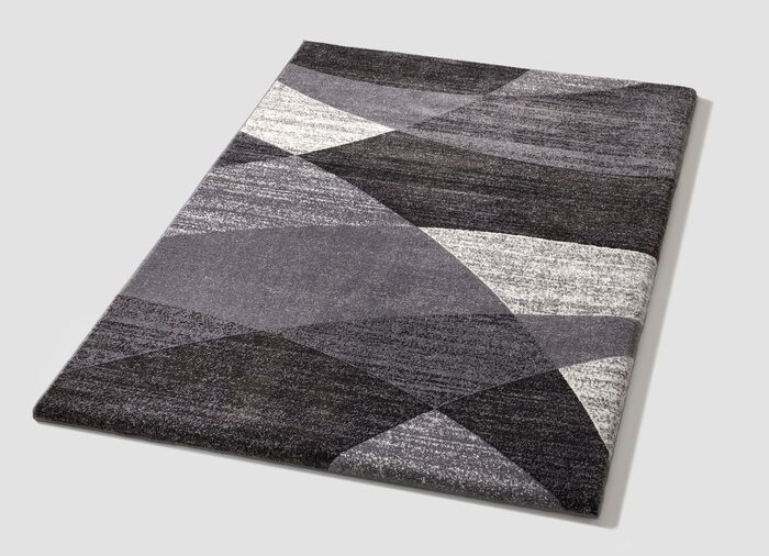 Br&uuml;cken und Teppiche mit hellen und dunklen Melierungen 