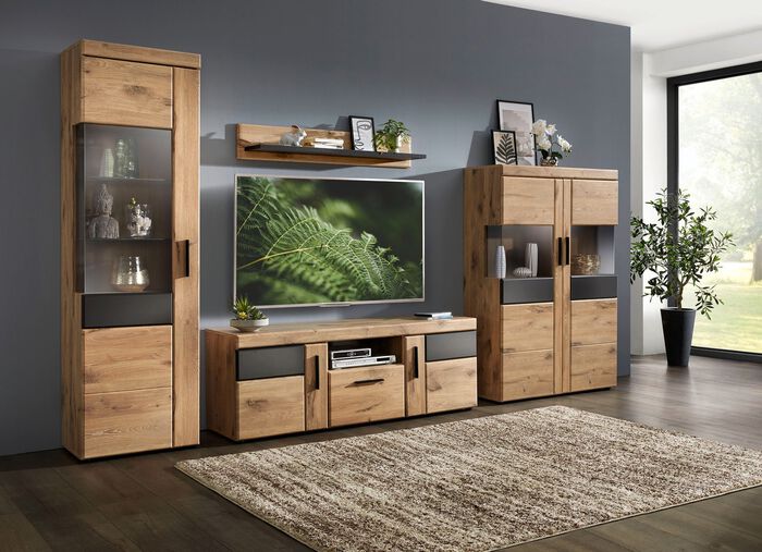 Wohnwand mit anthrazitfarbenen Elementen 