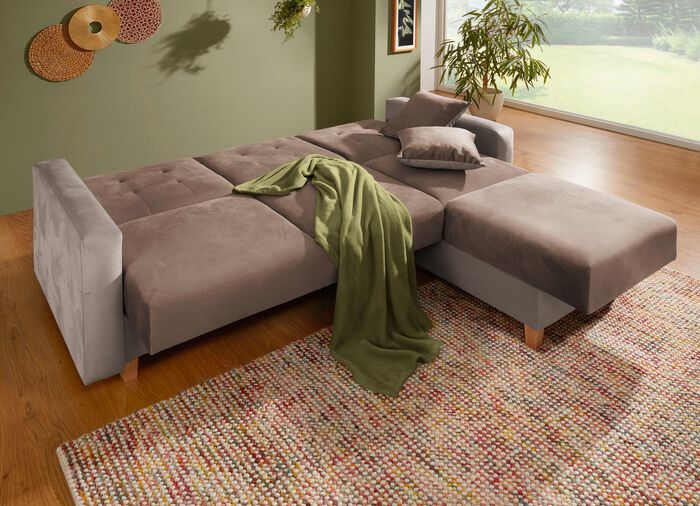 Polsterecke mit Bettfunktion und 2 Dekokissem 