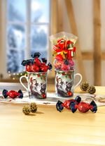 Mit Pralinen gef&uuml;llte Porzellantassen, 2er-Set 