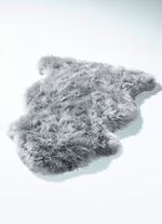 Vorleger aus echtem Lammfell in Tierform 