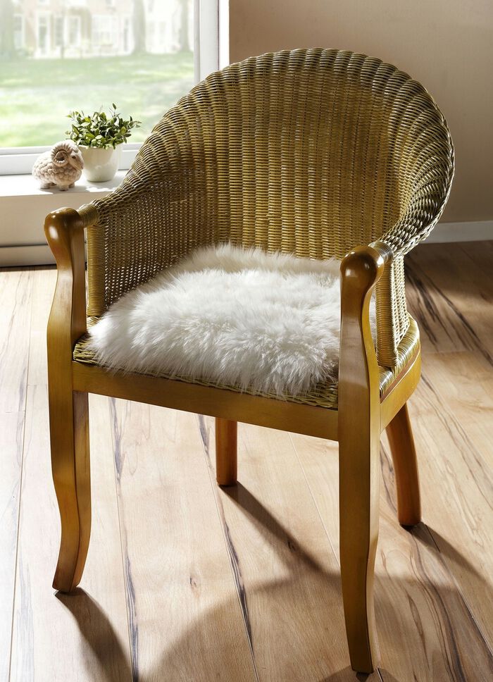 Merino-Lammfell-Sitzauflage in Tierform NATURWEISS