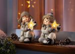 Figur Winterkind mit Stern WEISS