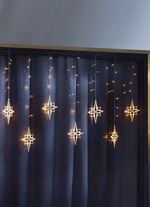 Lichtervorhang Sterne für den Innen- und Außenbereich 