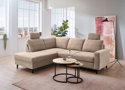 Polsterecke mit Bettfunktion und Ottomane 