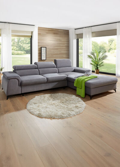 Polsterecke mit Bettfunktion und verstellbaren Kopfstützen 