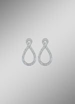 Funkelnde Eleganz: Ohrstecker mit Kristallen 