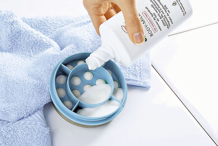 Rückencremer mit integrierten Rollen 