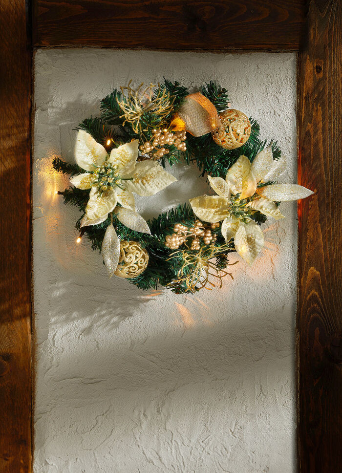 Beleuchteter Tannenkranz mit Poinsettia-Bl&uuml;ten 