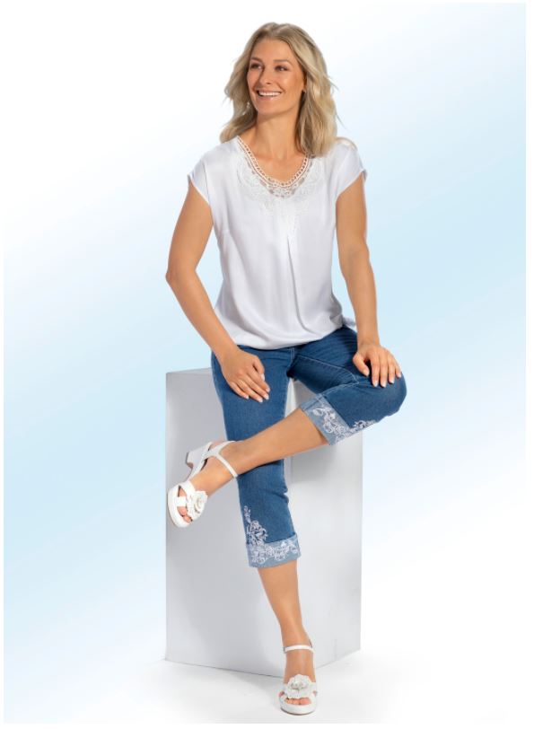 7/8-Jeans mit floraler Stickerei