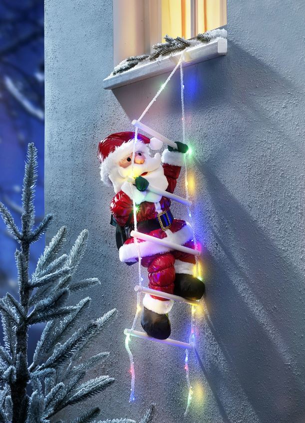 Weihnachtsmann auf LED-Leiter